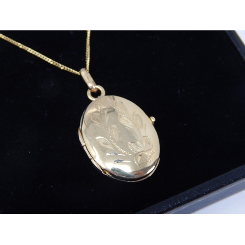 387 - 9ct Yellow Gold Locket on 9ct Gold Chain: Weight 3.56g: In Presentation Box