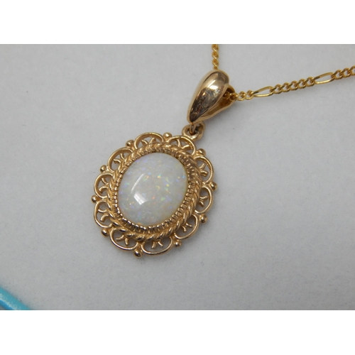 390 - 9ct Yellow Gold Chain (46cm) with attached 9ct Gold Opal Pendant: Gross weight 3.57g: In Presentatio... 