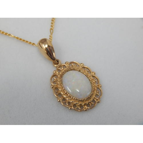 390 - 9ct Yellow Gold Chain (46cm) with attached 9ct Gold Opal Pendant: Gross weight 3.57g: In Presentatio... 