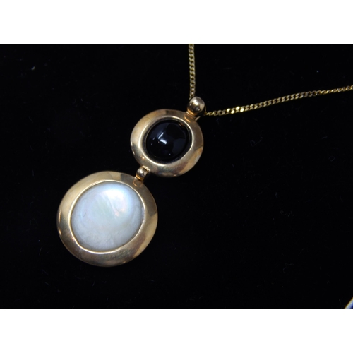 394 - 9ct Yellow Gold Gem Set Pendant on 9ct Gold Chain: Gross weight 2.73g: In Presentation Box