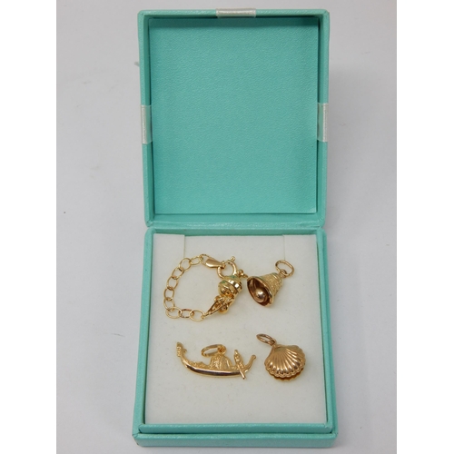 401 - A Group of 9ct Yellow Gold Charms: Gross weight 5.58g