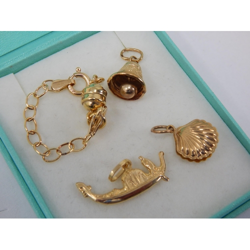 401 - A Group of 9ct Yellow Gold Charms: Gross weight 5.58g