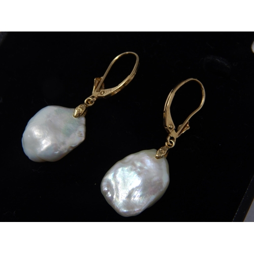 403 - A Pair of 9ct Yellow Gold Baroque Pearl Earrings in Presentation Case. gross weight 3.61g