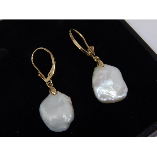 403 - A Pair of 9ct Yellow Gold Baroque Pearl Earrings in Presentation Case. gross weight 3.61g