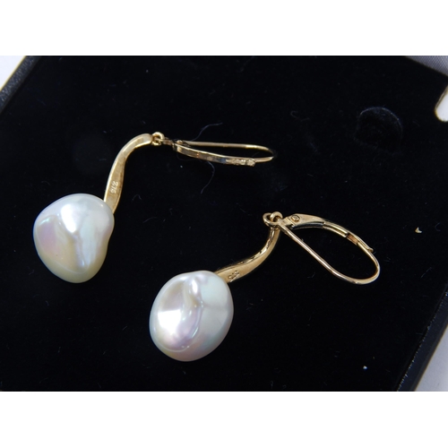 404 - A Pair of 9ct Yellow Gold Baroque Pearl Earrings in Presentation Case: Gross weight 4.04g