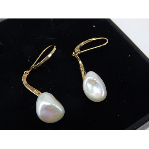 404 - A Pair of 9ct Yellow Gold Baroque Pearl Earrings in Presentation Case: Gross weight 4.04g