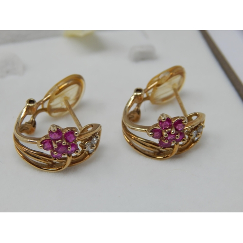 405 - A Pair of 9ct Yellow Gold Gem Set Earrings in Presentation Case: Gross weight 3.92g