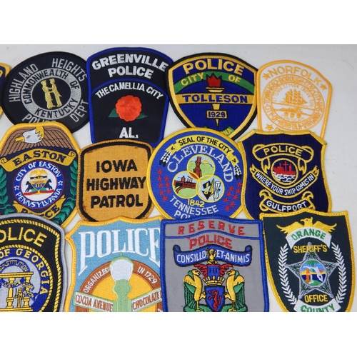 570 - A Collection of 25 Cloth USA Police Badges from a private collection