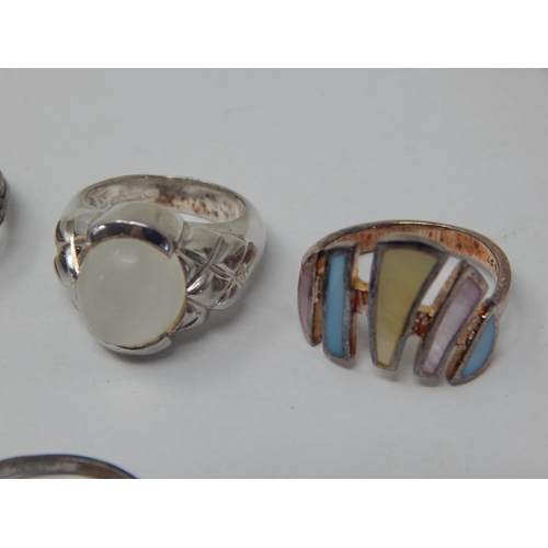 411 - A Collection of 8 Sterling Silver Rings.