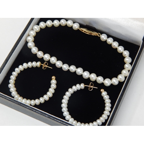 413 - A Pearl Bracelet & Earrings with 14ct Gold Mounts in Presentation Box