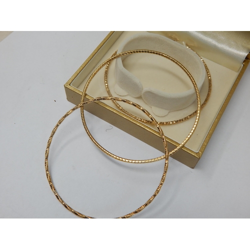 423 - Set of Three Sterling Silver & Gilded Bangles in Original Fitted Case