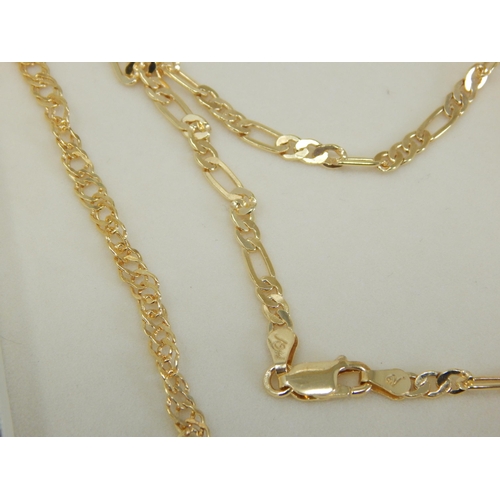 425 - A Collection of Four Sterling Silver & Gilded Neck Chains within Two Presentation Cases