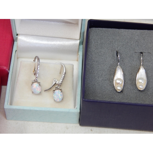 433 - 9 x Pairs of Sterling Silver Earrings in presentation Cases