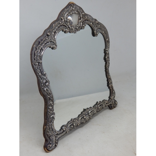 115 - A Large Edwardian Silver Fronted Easel Mirror with Rococo Decoration and vacant cartouche: Hallmarke... 