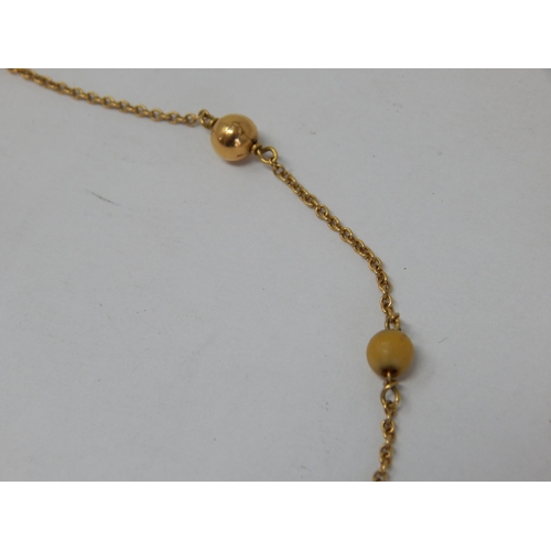 250 - 18ct Gold Beaded Necklace: Length 42cm: gross weight 5.56g