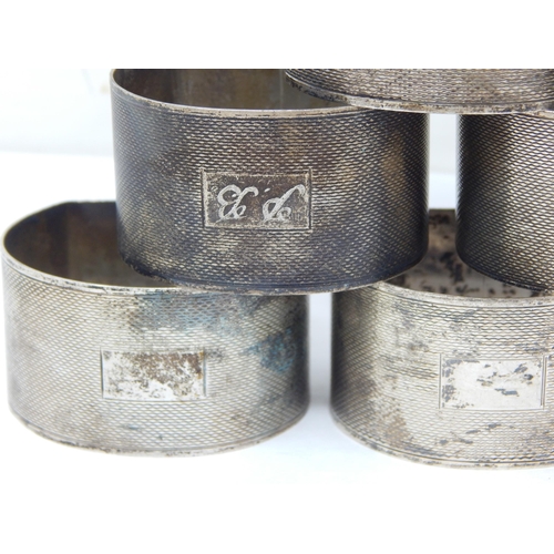 127 - Set of 6 Silver Napkin Rings with Engine Turned Decoration: Hallmarked Birmingham 1966 by Roberts & ... 