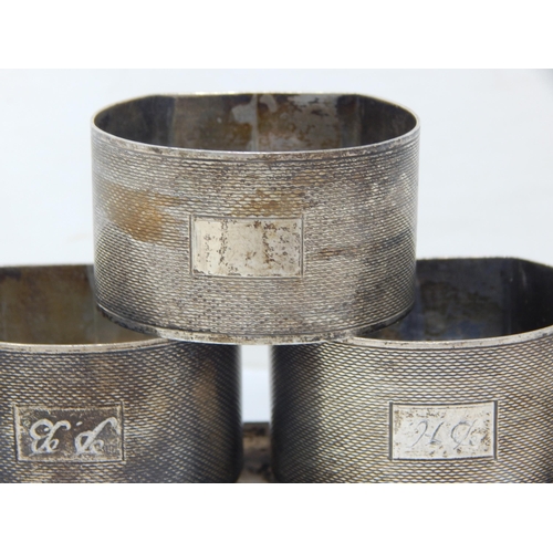 127 - Set of 6 Silver Napkin Rings with Engine Turned Decoration: Hallmarked Birmingham 1966 by Roberts & ... 