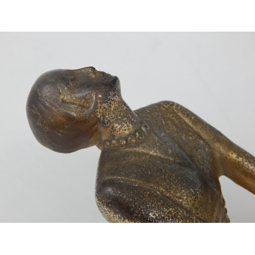 573 - A Period Art Deco Cast Metal Figural Table Lamp, the woman with outstretched arms supporting the lig... 