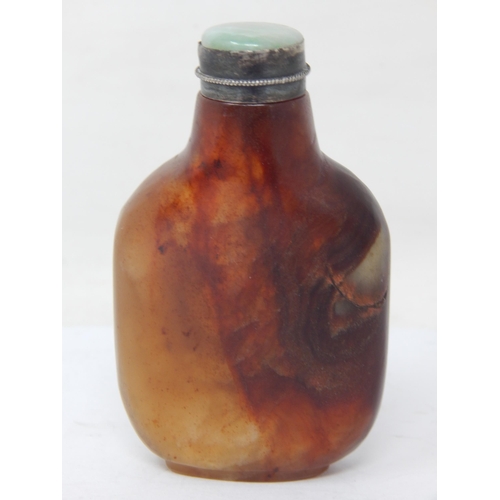 581 - C18th/C19th Chinese Mottled Jade Snuff Bottle. the inset green jade & white metal mounted top with i... 