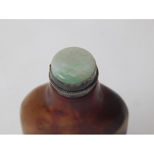 581 - C18th/C19th Chinese Mottled Jade Snuff Bottle. the inset green jade & white metal mounted top with i... 