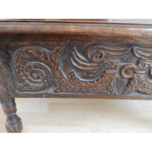 588 - Small Oak Coffer with Carved Decoration depicting mythical creatures to the front panel & carved sid... 