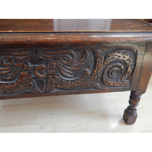 588 - Small Oak Coffer with Carved Decoration depicting mythical creatures to the front panel & carved sid... 