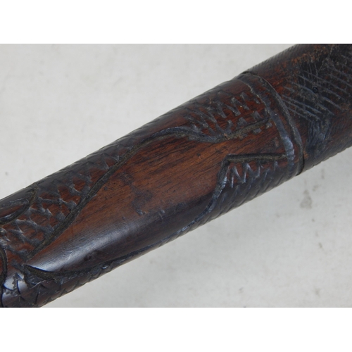 644 - Tribal hardwood staff with carved decoration depicting native figures: 91.5cm (36