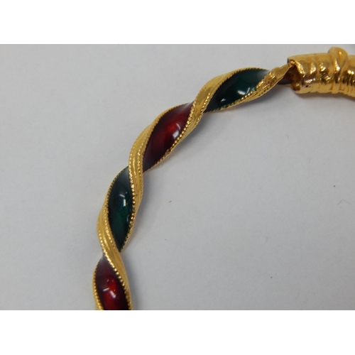 298 - Indian 22ct Gold Bangle of twist design with Ruby & Emerald Coloured Enamels, Fashioned with Elephan... 