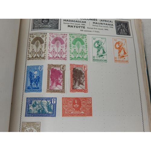 6 - A Vintage Movaleaf Stamp Album containing a substantial collection of GB & world stamps; Sorting wil... 