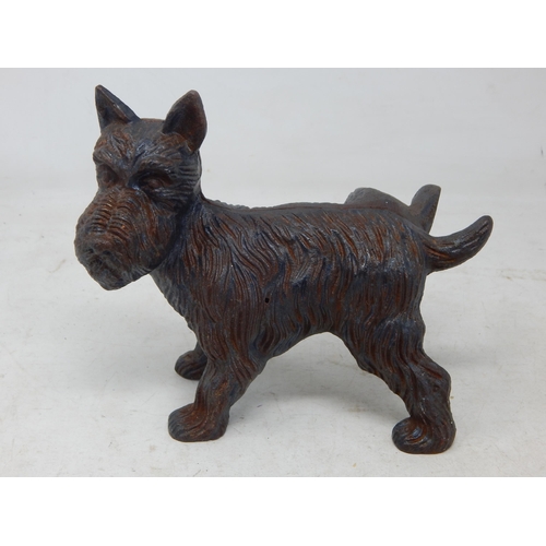 640 - Cast Iron Door Stop in the form of a Scottie Dog cocking his leg