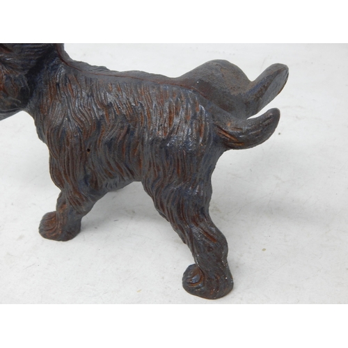 640 - Cast Iron Door Stop in the form of a Scottie Dog cocking his leg