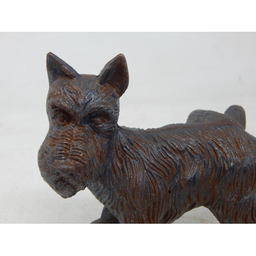 640 - Cast Iron Door Stop in the form of a Scottie Dog cocking his leg