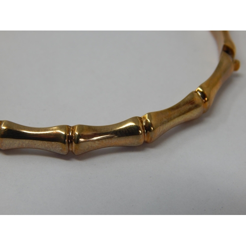 301 - 9ct Yellow Gold Bangle: Width 7.5cm: Weight 7.89g: