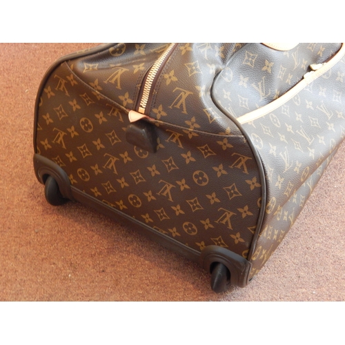 164 - Louis Vuitton Large Monogram Travel Bag, twin handled with concealed extendable handle on wheels wit... 