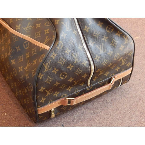 164 - Louis Vuitton Large Monogram Travel Bag, twin handled with concealed extendable handle on wheels wit... 