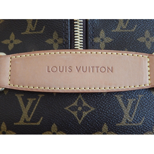 164 - Louis Vuitton Large Monogram Travel Bag, twin handled with concealed extendable handle on wheels wit... 