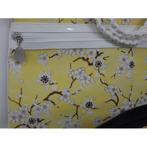 160 - LULU GUINNESS. LONDON Bag with Lotus Blossom Pattern on a Yellow Ground, 30cm wide together with a B... 