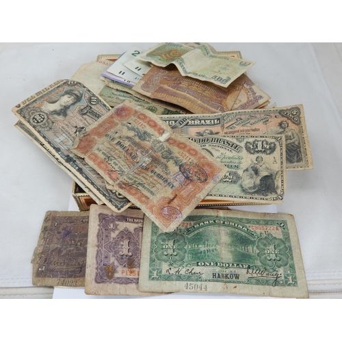 3 - A Quantity of Banknotes Including a 1912 Chinese Hankow Dollar, further Chinese Banknotes etc contai...