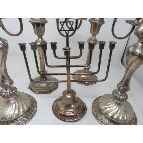 139 - Two Pairs of Silver Plated Candlesticks/Candelabra together with a Plated Menorah.