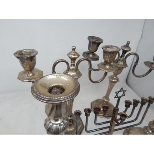 139 - Two Pairs of Silver Plated Candlesticks/Candelabra together with a Plated Menorah.