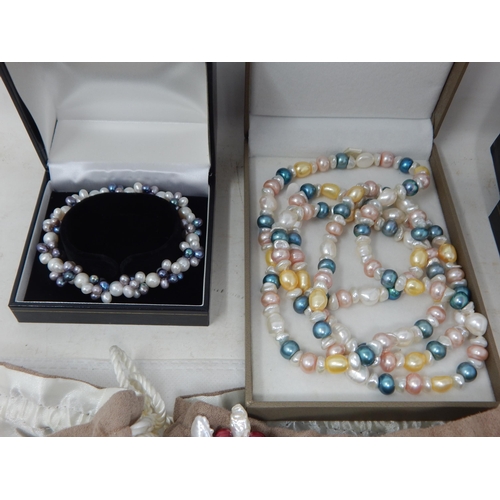 440 - A Collection of Freshwater Pearl Necklaces & Bracelets: All in Pouches or Boxes (lot)