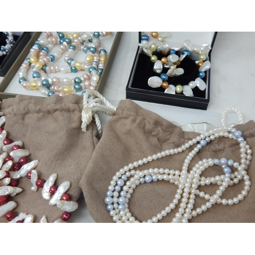 440 - A Collection of Freshwater Pearl Necklaces & Bracelets: All in Pouches or Boxes (lot)