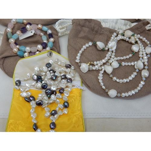 440 - A Collection of Freshwater Pearl Necklaces & Bracelets: All in Pouches or Boxes (lot)