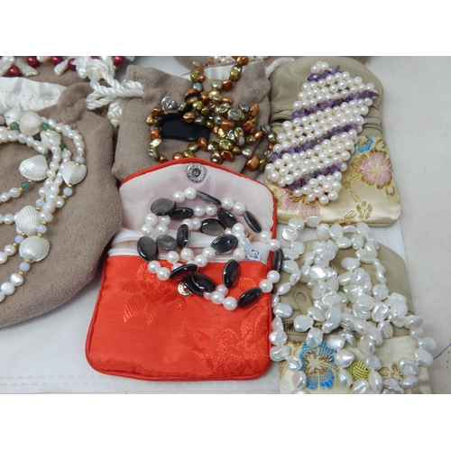 440 - A Collection of Freshwater Pearl Necklaces & Bracelets: All in Pouches or Boxes (lot)