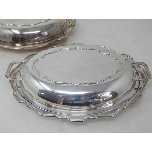 700 - A Good Pair of Silver Entree Dishes of Oval Form with Shaped Rims & Twin Handled Lids: Hallmarked Sh... 