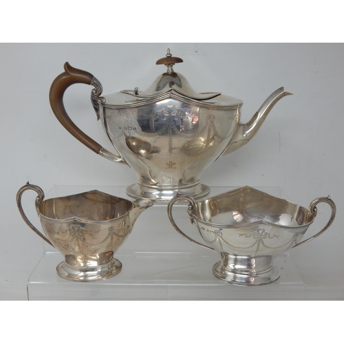 701 - Silver Three Piece Tea Set Comprising Teapot, Sugar Bowl & Milk Jug with Shaped Rims & Bow & Swag En... 