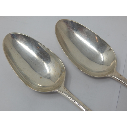 719 - A Pair of 18th Century Irish Pointed Terminal Silver Serving Spoons with Crest of Bird & Bright Cut ... 