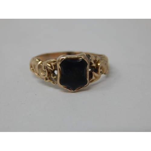 287 - A 19th Century Unmarked Gold Ring Set with a Shield Shaped Reverse Engraved Seal: Size J/K in Origin... 