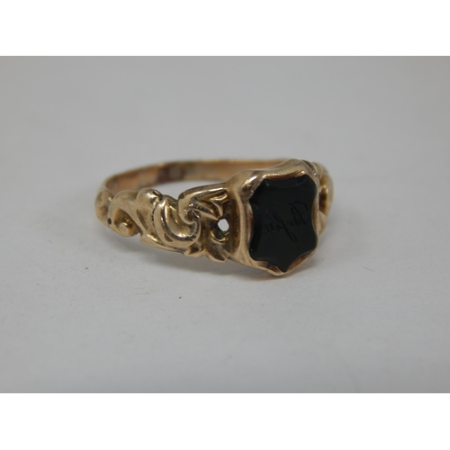 287 - A 19th Century Unmarked Gold Ring Set with a Shield Shaped Reverse Engraved Seal: Size J/K in Origin... 