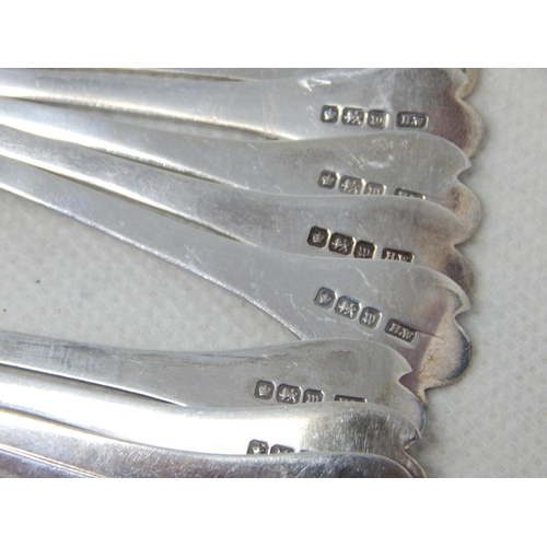 731 - Set of 12 Silver Coffee Spoons with Trefid Terminals: Hallmarked Sheffield 194 by Henry Wilkinson: L... 